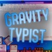 Le logo Gravity Typist Icône de signe.